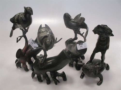 Lot 141 - A pair of Chinese bronzed metal figures of...