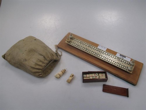 Lot 170 - A 19th century bone cribbage board, with...