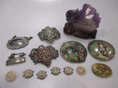 Lot 165 - A Chinese amethyst or purple quartz carving of...
