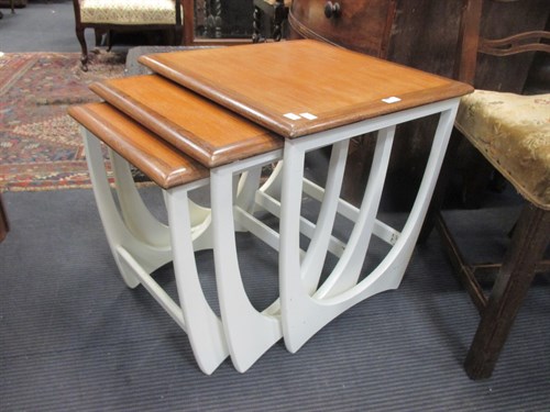 Lot 375 - A nest of G-Plan Fresco afromosia tables