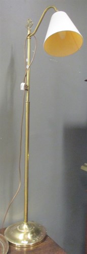 Lot 514 - A Laura Ashley free-standing brass reading...