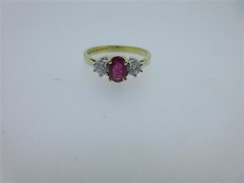 Lot 182 - An 18ct gold ruby and diamond ring