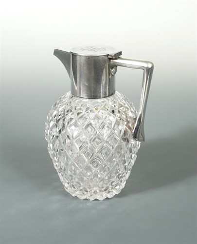 Lot 398 - An Edward VII silver topped claret jug