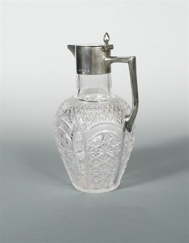 Lot 383 - A Victorian silver topped claret jug