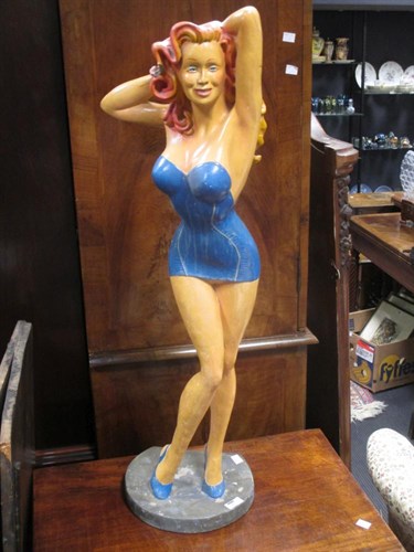 Lot 117 - A 1950's style fibreglass figure of a glamour...