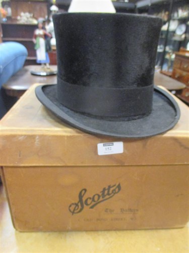 Lot 152 - A silk top hat by Simpson, Picaddilly, size 7...