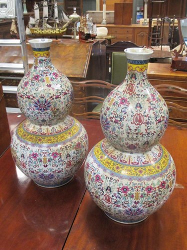 Lot 121 - A large pair of Chinese double gourd vases (2)