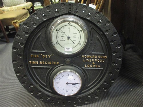 Lot 393 - A circular cast iron plaque inset with later...