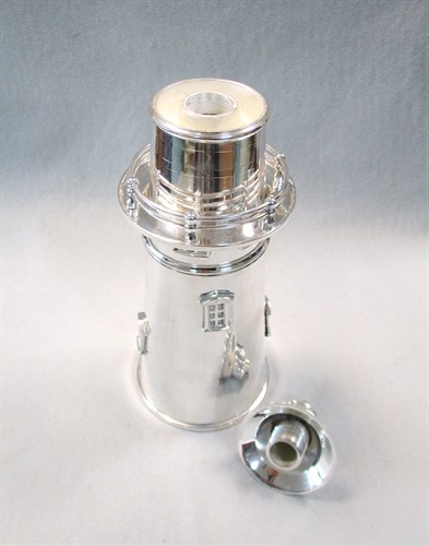 Lot 97 - A modern electroplate novelty cocktail shaker in the form of a lighthouse
