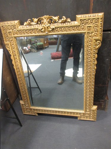 Lot 481 - A rectangular carved gilt mirror overall size...