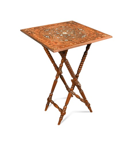 Lot 651 - A late 19th century Syrian marquetry inlaid folding occasional table