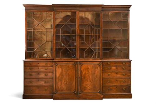 Lot 583 - A George III mahogany breakfront library bookcase