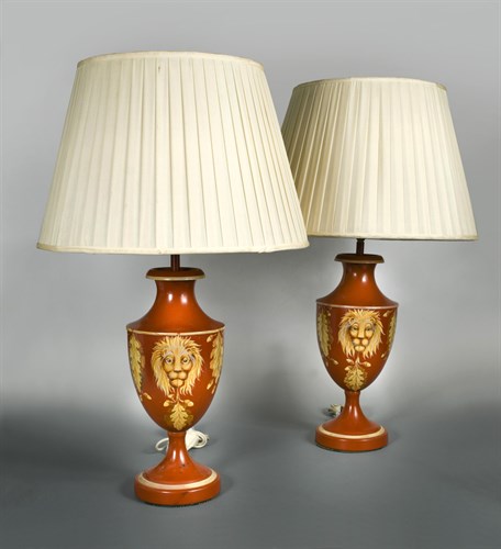 Lot 441 - A pair of red-painted toleware table lamps