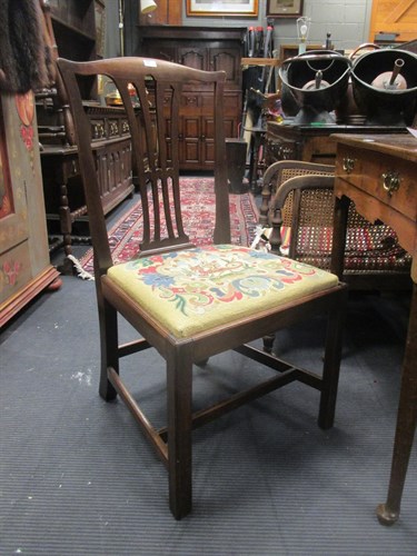 Lot 496 - A mahogany dining chair with embroided drop in...
