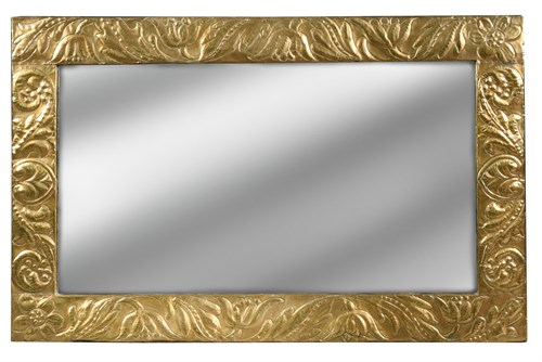 Lot 121 - An Arts & Crafts brass wall mirror