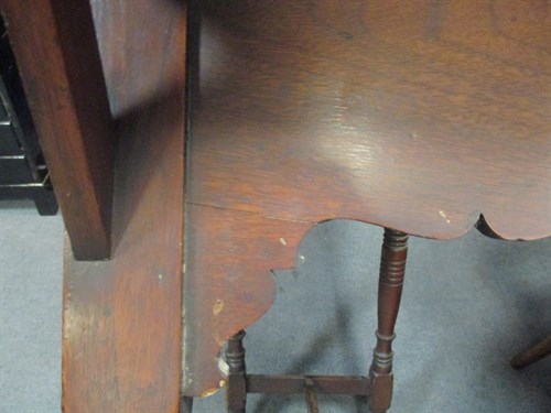 Lot 122 - An Arts and Crafts walnut side table, the...