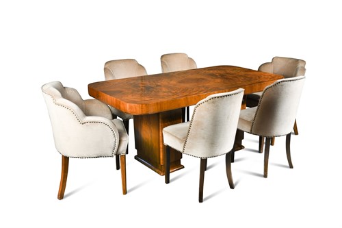 Lot 151 - An Art Deco walnut dining table and six chairs