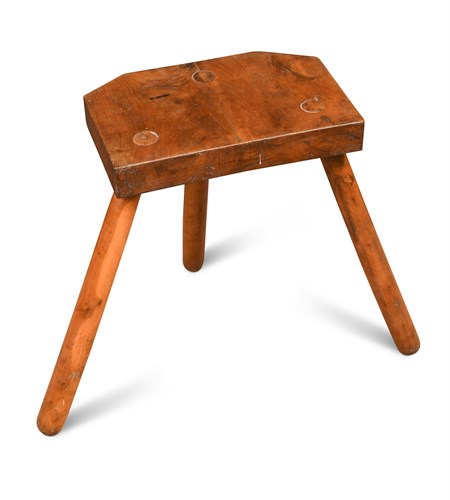 Lot 695 - A late nineteenth/early twentieth century primitive stool