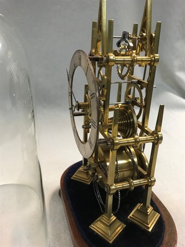 Lot 482 - A 19th century Gothic design brass skeleton timepiece
