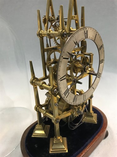 Lot 482 - A 19th century Gothic design brass skeleton timepiece