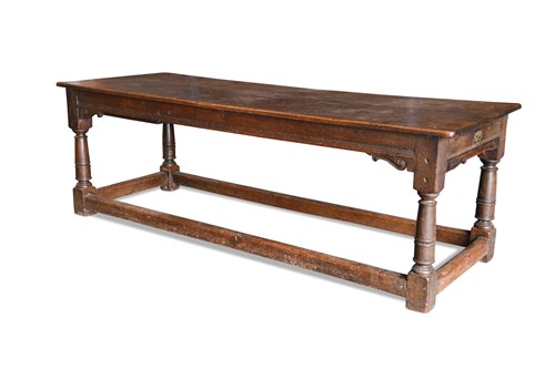Lot 512 - An antique oak refectory