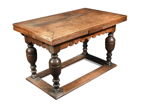Lot 507 - A 17th century style Flemish style oak draw leaf refectory table