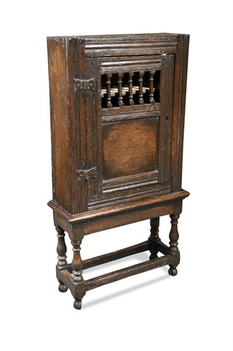 Lot 505 - A 17th century and later oak dole cupboard