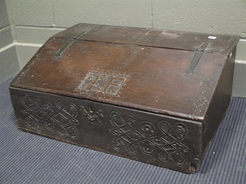 Lot 436 - A 17th century carved oak bible box, having...