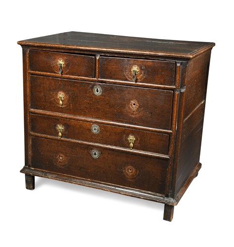 Lot 539 - A 17th century oak chest of two short and three long drawers