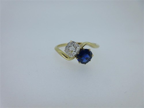 Lot 203 - A sapphire and diamond two stone ring