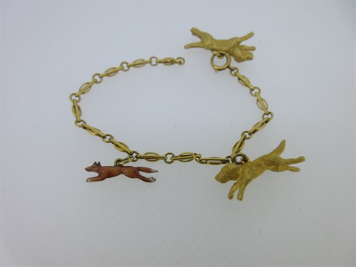 Lot 111 - A fox and hounds bracelet