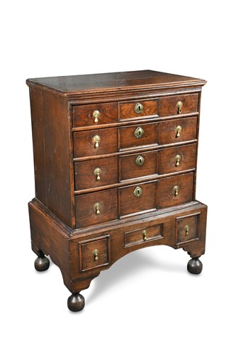 Lot 536 - A William & Mary period oak chest of four long drawers