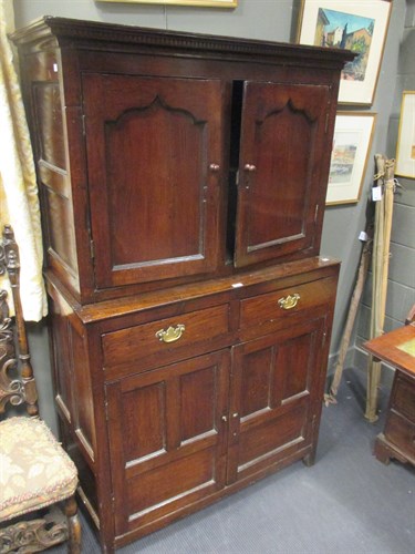 Lot 451 - An 18th century oak cupboard, the recessed...