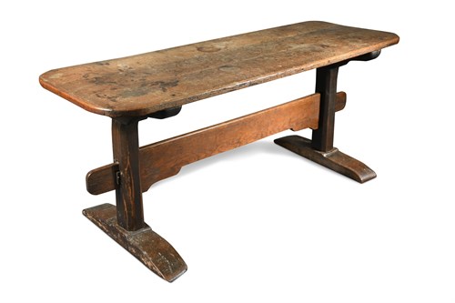 Lot 520 - An oak trestle style refectory table