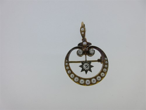 Lot 206 - An early 20th century diamond and seed pearl pendant / brooch