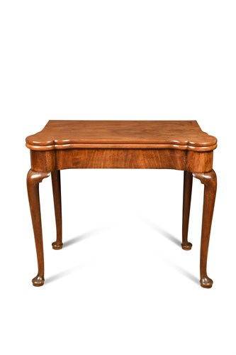 Lot 541 - A George II walnut games table