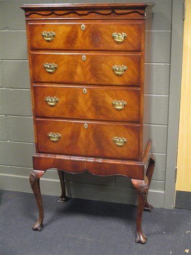 Lot 449 - A mahogany 'Tallboy' chest on carved cabriole...