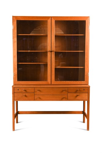 Lot 182 - Peter Løvig Nielsen, a Danish teak cabinet on stand