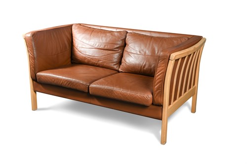 Lot 190 - Stouby, a Danish conker brown leather three-seat sofa and another  two-seat sofa