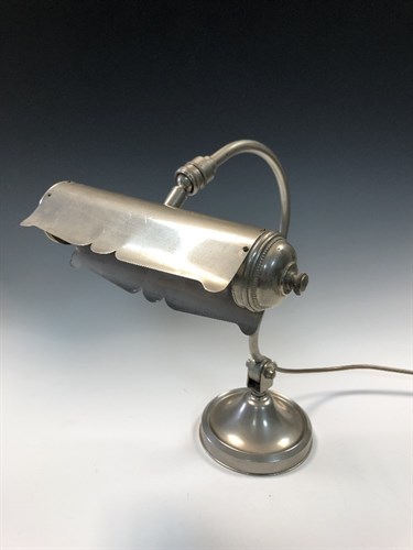 Lot 100 - An early 20th century nickel plated bankers type table lamp