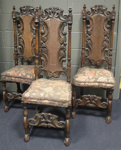 Lot 452 - A set of six Carolean style carved oak dining...