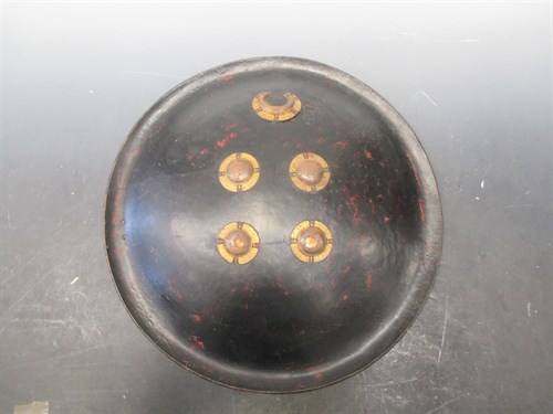 Lot 130A - A Dhal shield with brass mounts, 58 cms
