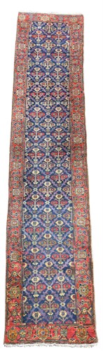 Lot 519 - A Heriz runner