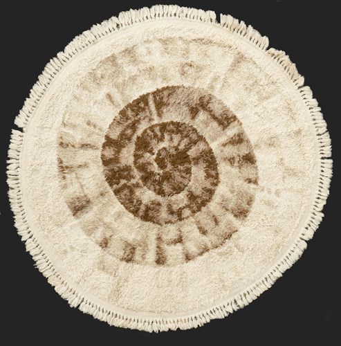 Lot 194 - A 1960s circular deep-pile wool rug