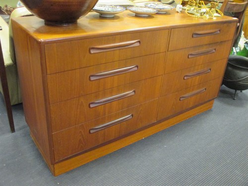 Lot 428 - A Danish style teak double bank chest of eight...