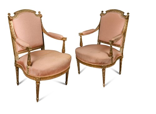 Lot 563 - A pair of Louis XVI style carved gilt wood...