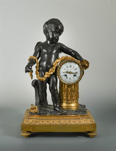 Lot 489 - A Louis XVI style bronze and ormolu mantel clock, 19th century