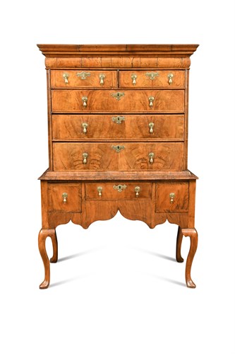 Lot 548 - An 18th century walnut chest on stand