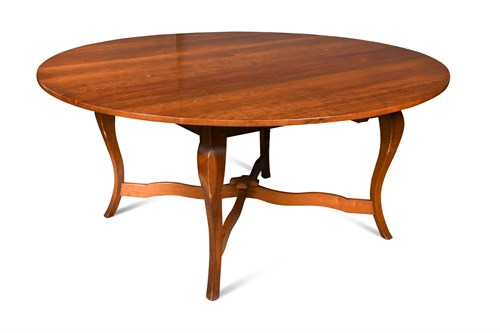 Lot 656 - A 20th century French cherry wood circular table