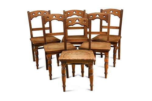 Lot 652 - A set of eight late 19th century oak Gothic chairs